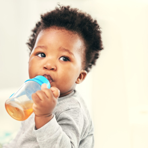 young child drinking