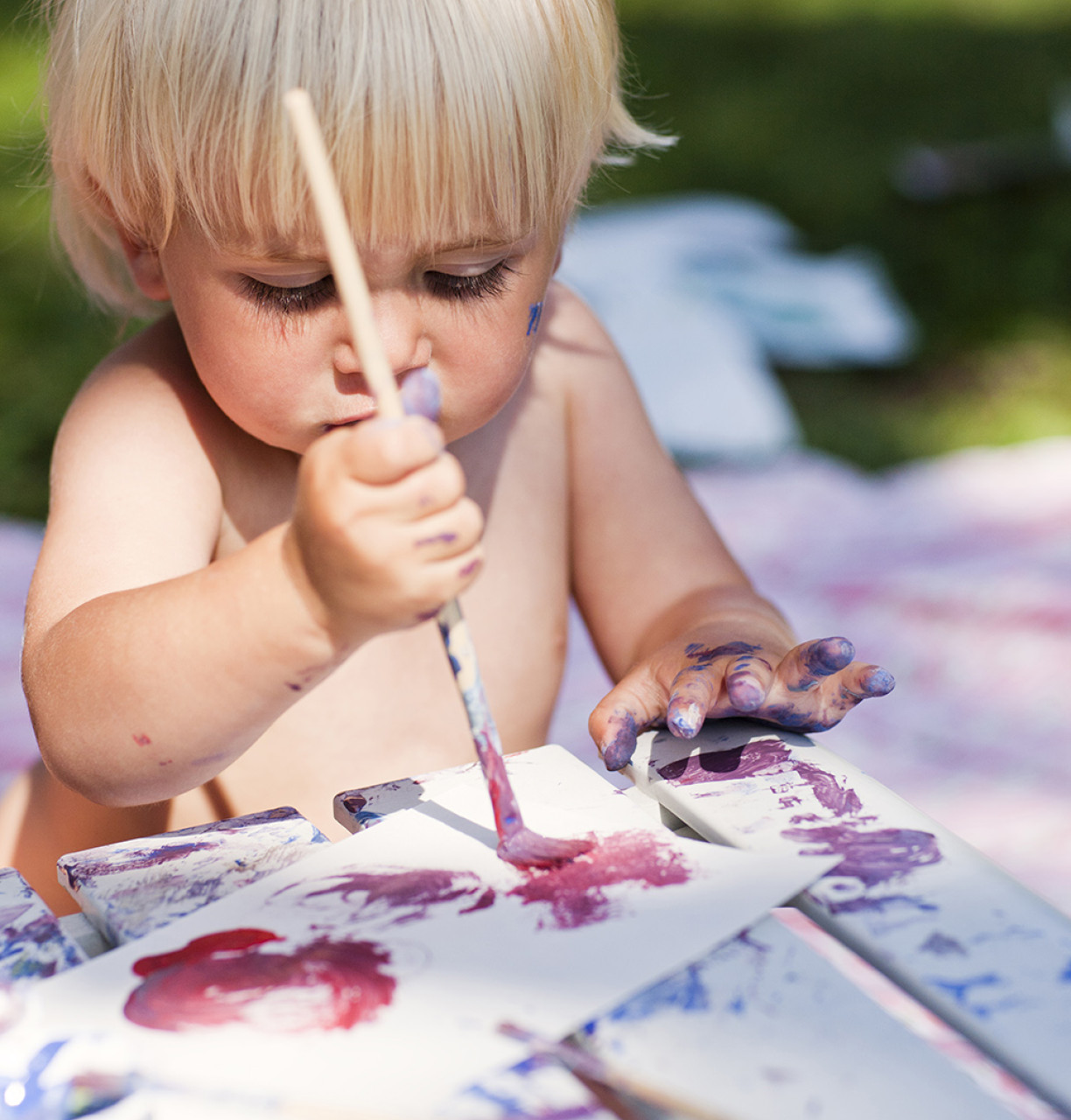 little boy painting